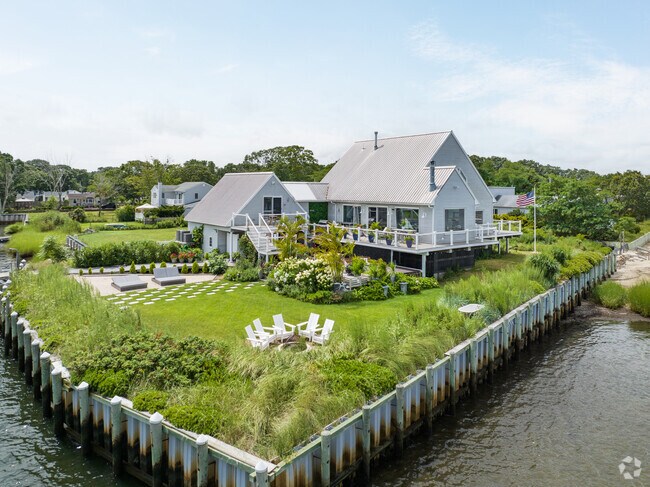 Some homes with spacious yards overlook the bay in Westhampton.