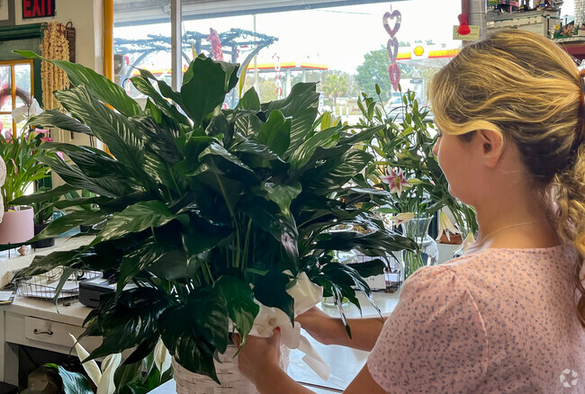 The Clermont Florist delights in crafting arrangements for visitors daily.
