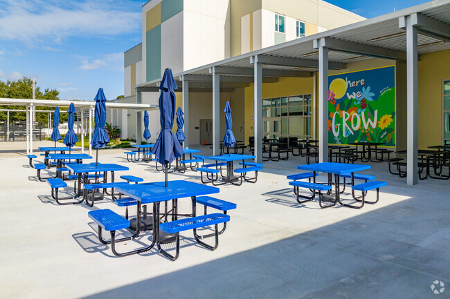 Students at Pershing School can enjoy lunch outside with a nice colorful art mural.