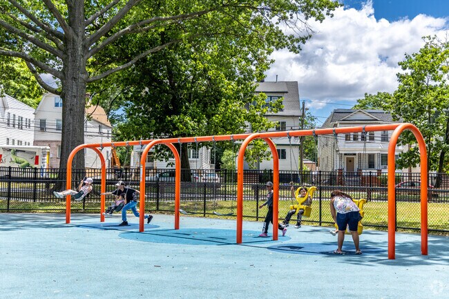 Experience the thrill of the swing and embrace the refreshing breeze at Vailsburg Park in Newark.