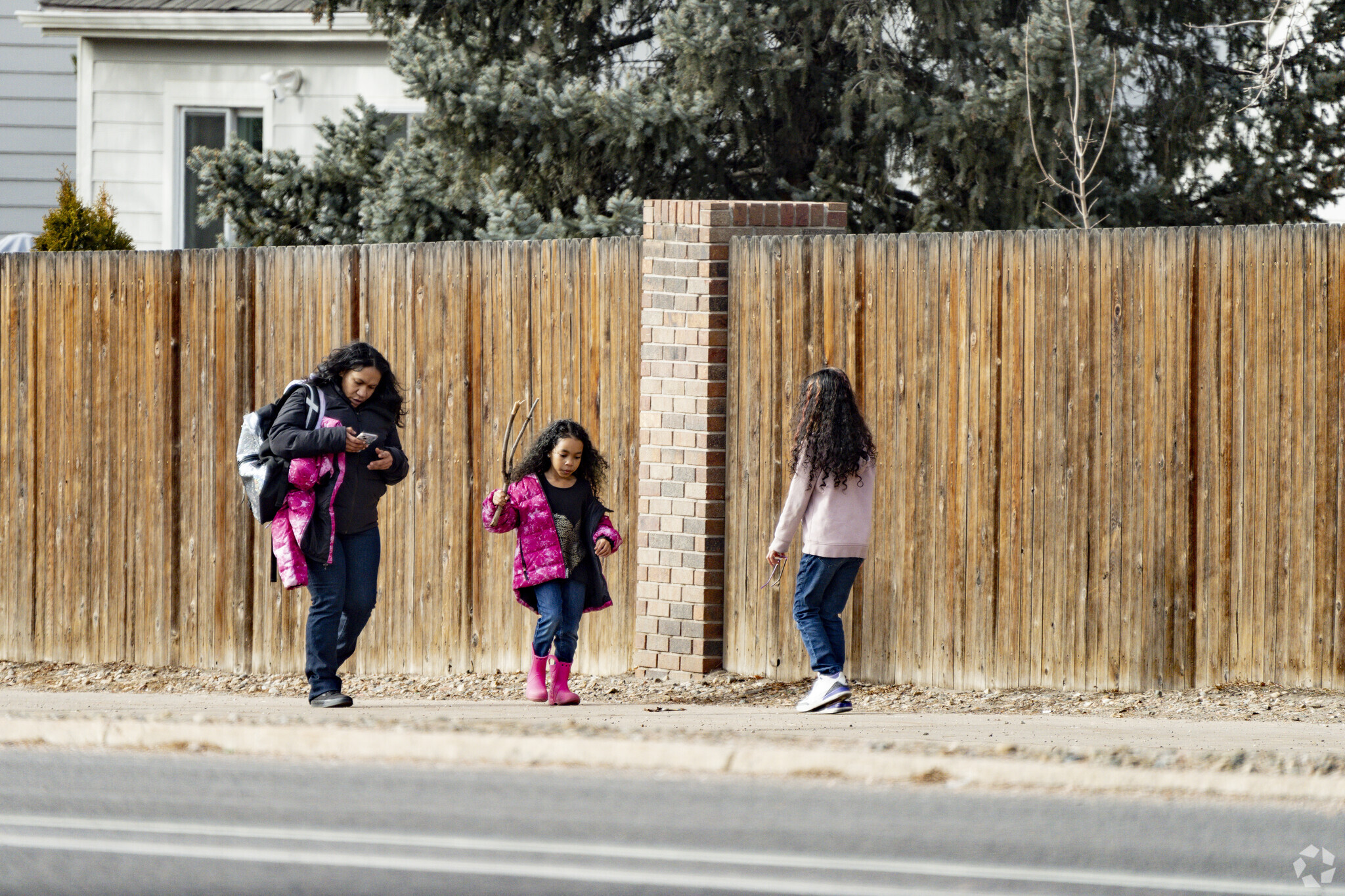 In Prides Crossing, Colorado families walk their kids home from school.