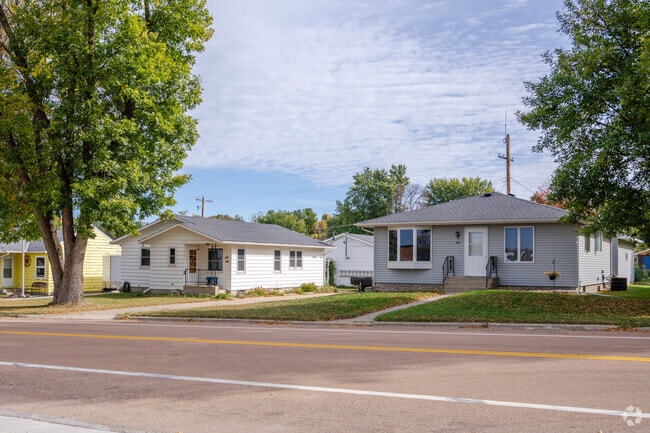 Single-story homes along Mayer’s main road highlight timeless American design and community pride.