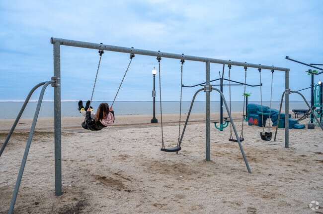 Locals enjoy a playground right on the beach at Seaside Park 2 miles from Brooklawn-St. Vincent.