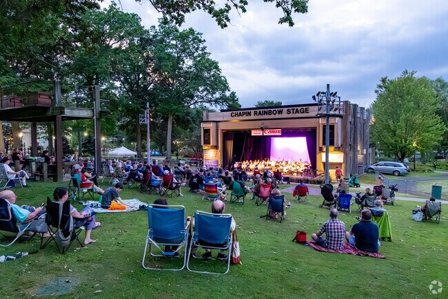 Huntington residents grab their beach chairs to enjoy and evening of music.