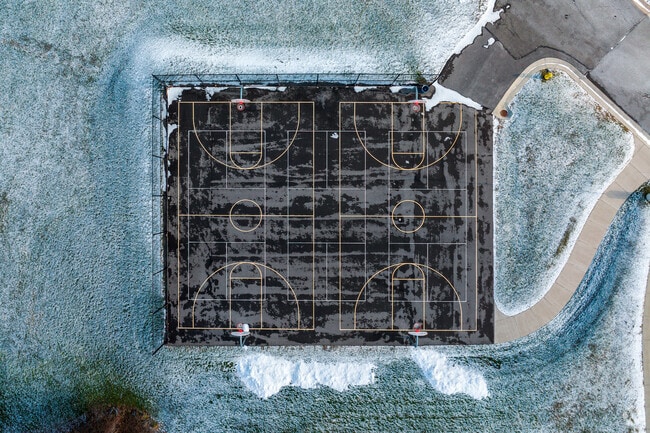 Onondaga Hill Middle School's basketball courts as seen from above.