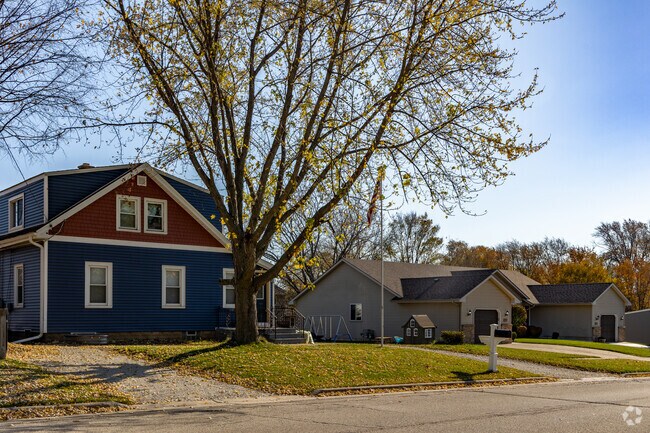 Row of homes in the golden hour sunlight within the neighborhood of Stocker.