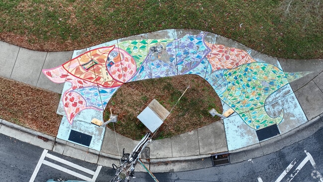 The sidewalks in East Forest contain some art as well.