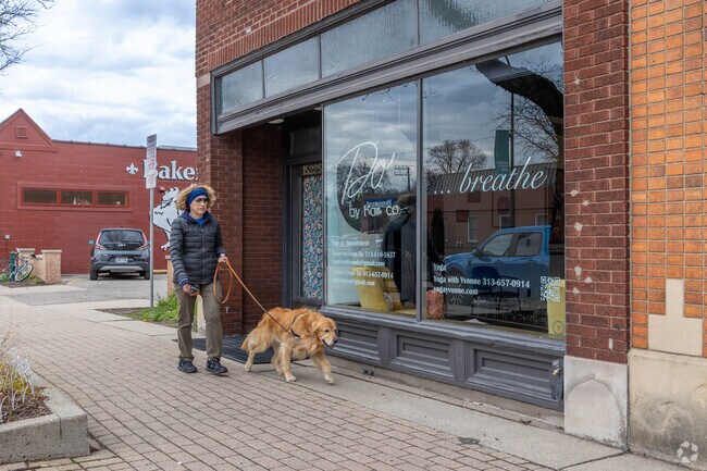 Riverbend residents enjoy a stroll along Kercheval Avenue near Riverbend.