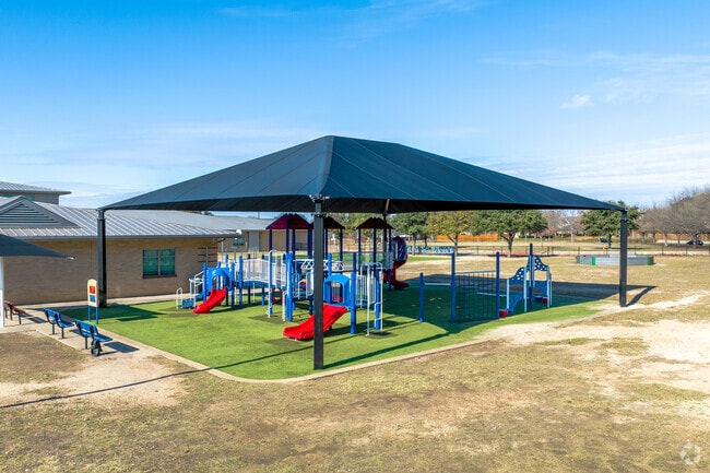 Bright Academy has a covered playground to keep students cool in the summer months.