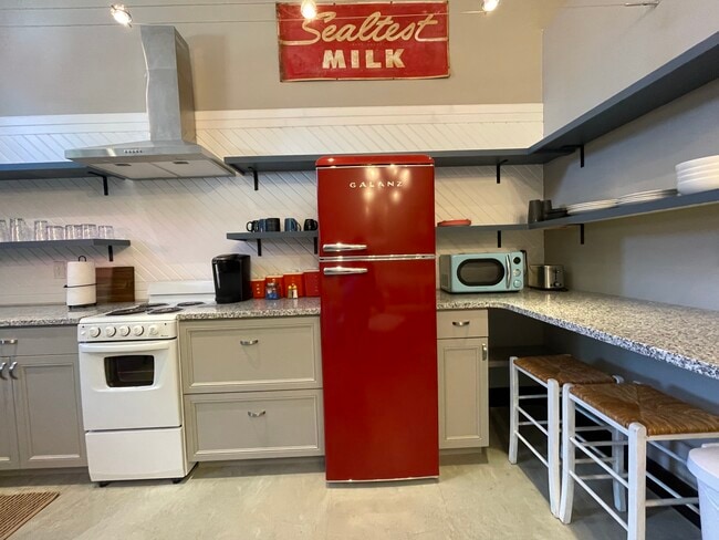 Open shelving, microwave, and