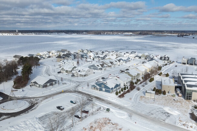 Muskegon Lake is dotted with more new homes every day, growing the Nelson neighborhood.