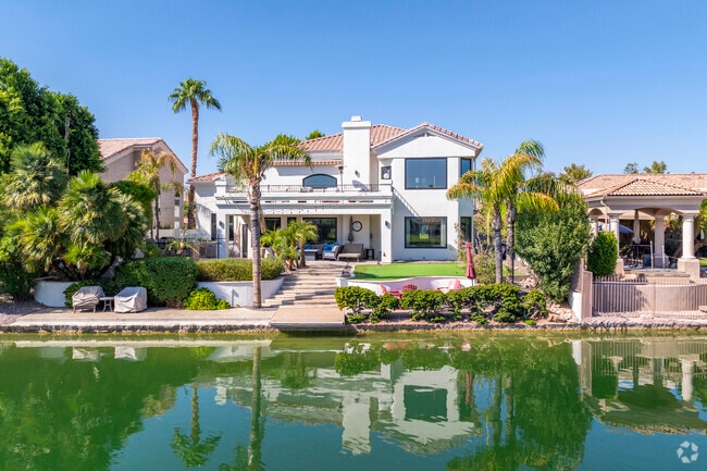 Val Vista waterfront homes offer the perfect blend of elegance and tranquility.