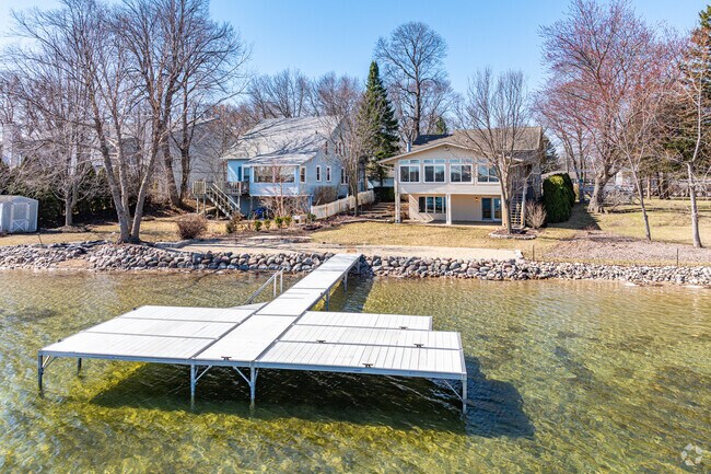 Many lakefront homes in Salem Lakes, Wisconsin offer boat docks in the backyard.