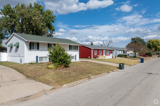 Ranch-style homes come in a variety of sizes and colors in the Greenbrier neighborhood.