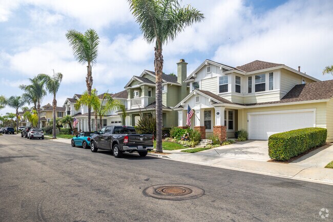 Craftsman-style homes sit on a quiet residential street in the South Beach neighborhood.