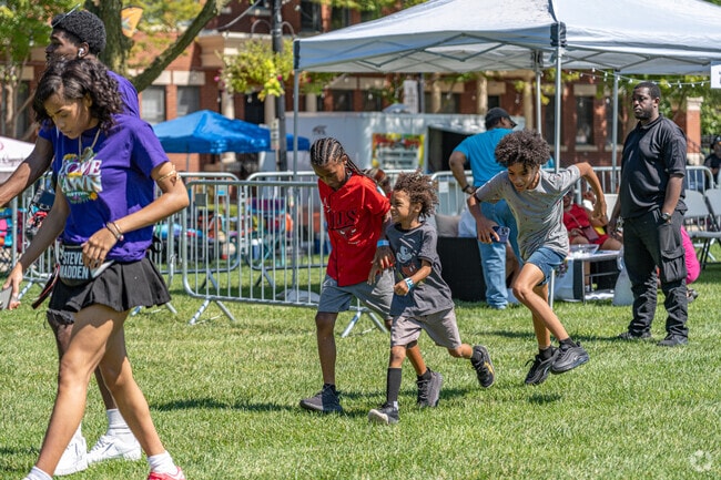 Your kids will love dancing to the music at the Love on the Lawn Festival in Elgin.