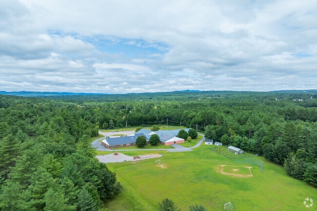 Students can enjoy a large field of grass behind the Southwick School in Northfield.