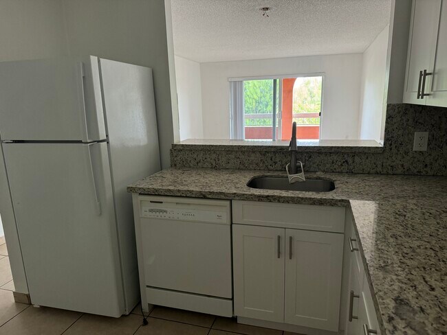 7800 Camino Real unit Village of Kings Cre, Miami, FL 33143 - photo 6