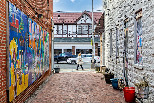 Upper Montclair captivates its residents with a vibrant display of artwork that adorns the neighborhood, highlighting its unique charm and character.