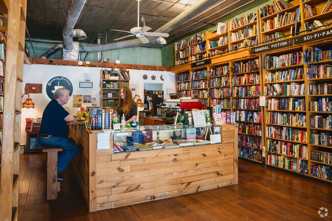 Hampton's Speakeasy Bookstore is a gem where guests can peruse through floor-to-ceiling books.