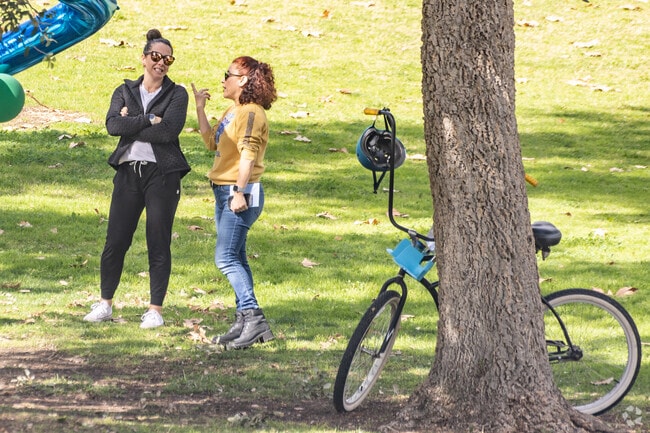 Cyclists enjoy a quiet ride through the tree-lined streets of Sunny Hills.