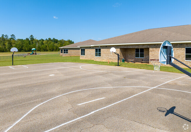 James W Wilson Junior Elementary has a basketball court for those who love the game.