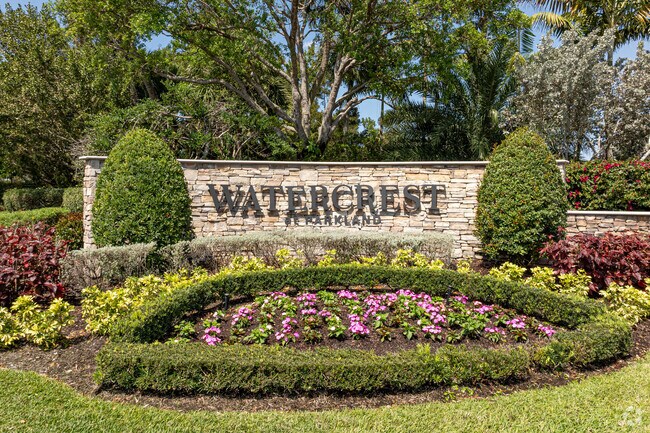 Colorful landscaping adorns the neighborhood of Watercrest at Parkland.