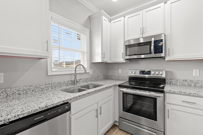 2BR, 2BA - 980 SF - Upstairs Kitchen