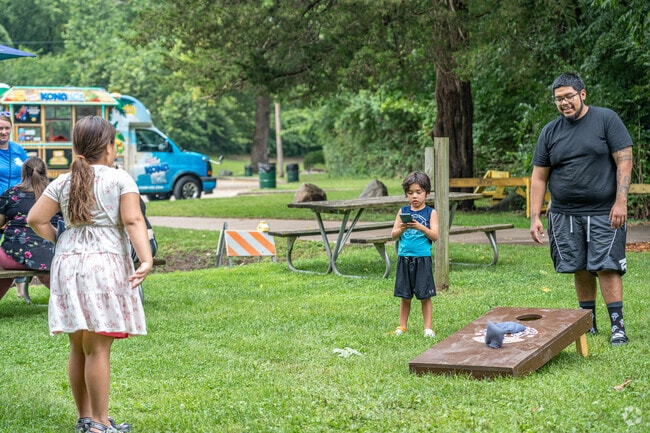 Residents of Hamilton Park can enjoy a game of bags at Parks on Tap.