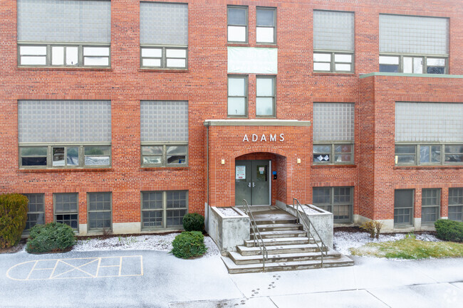 Adams Elementary's front entrance is located off of a main arterial road.
