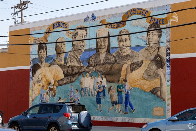 This mural is a powerful statement on the wall of El Burrito Mercado in the West Side neighbood.