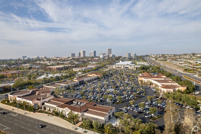 An elevated look at Corona Del Mar Plaza with Newport Center and Fashion Island nearby.