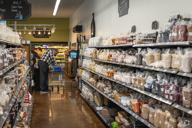 A local checks out with his groceries at the Wildwood Natural Food Market.