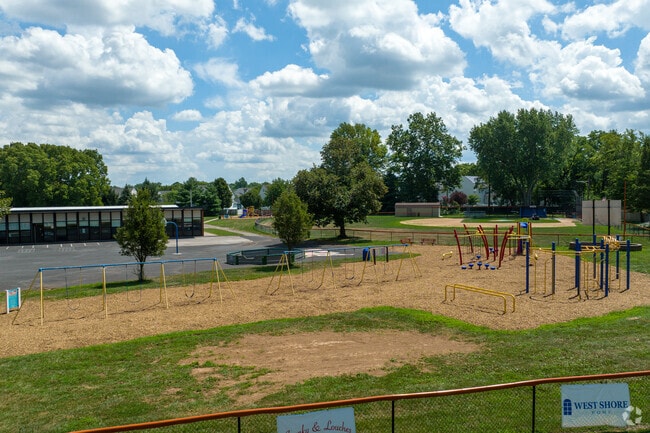 Cole Manor Elementary School has an open green space for students to run around.