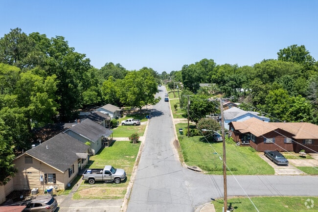 Most Levy yards feature grass and large shade trees.