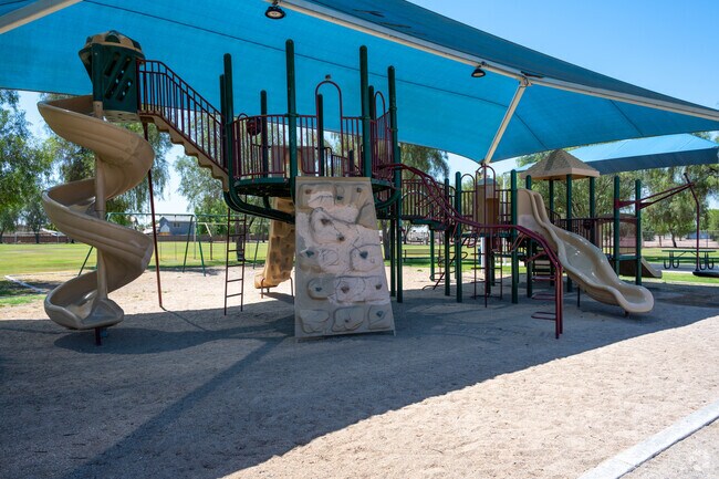Swing sets and jungle gyms make Jiggs Johnson Park a popular spot for kids.