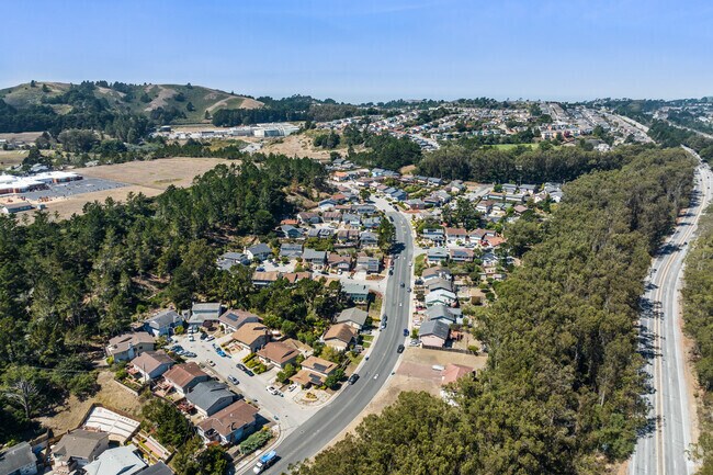 Enjoy Portola Highlands' scenic roads and charming homes, just minutes from scenic Pacifica.