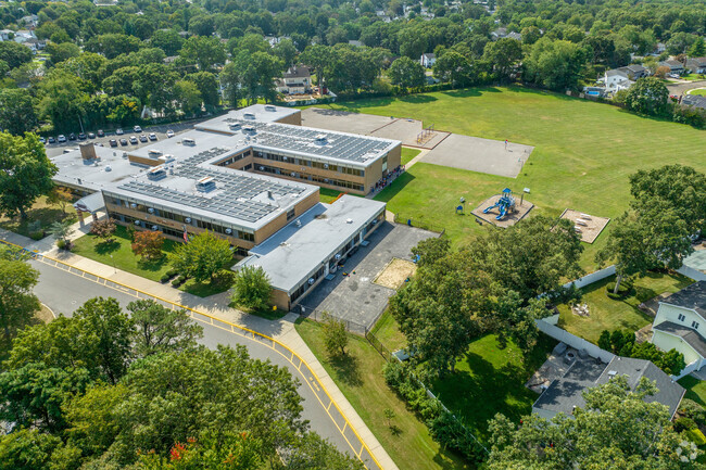 The students of John Quincy Adams Elementary School have plenty of space to play.