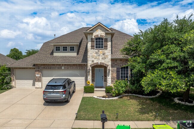 Spacious modern transitional homes have gabled roofs and arched entryways in Paloma Creek South.