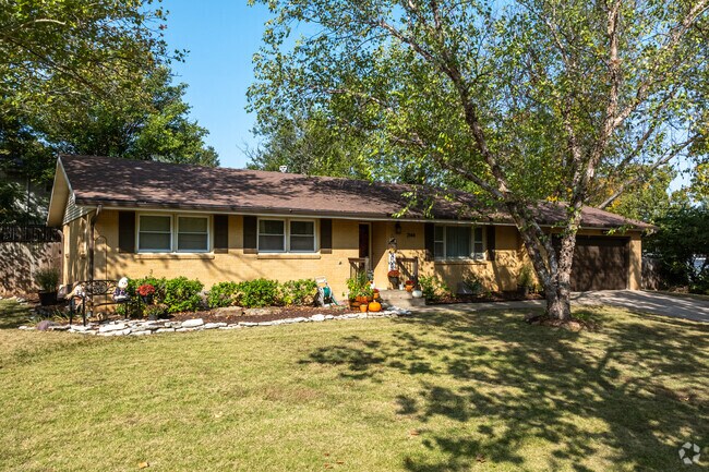 Homes in Blue Hills have brick facades and fenced back yards.