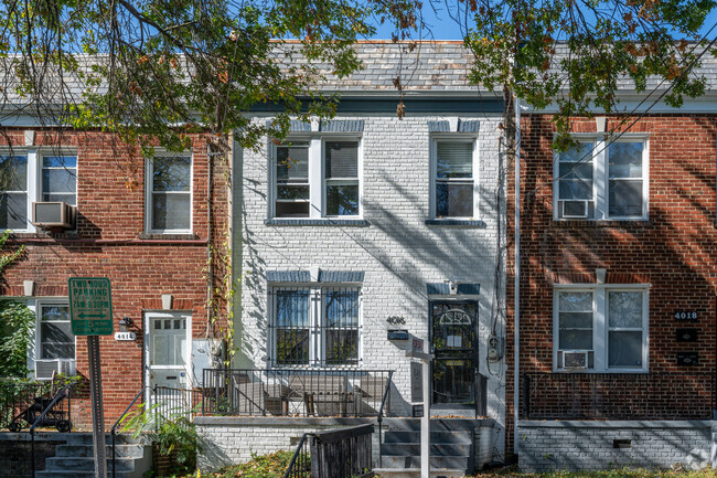 Federal style brick row homes on 9th St NE near Catholic University.