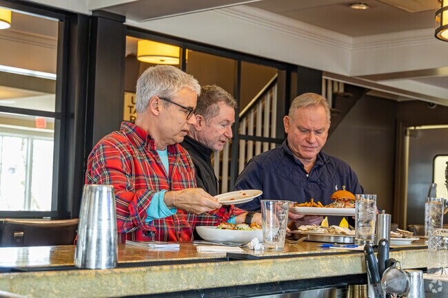 The Gladstone Tavern offers a menu of seasonal American comfort food & a lively bar.