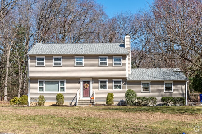 Colonial Revivals such as this one usually cost between $400 and $700,000 in Oronoque.