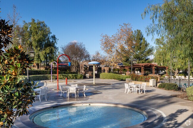 Residents relax at the spa provided by the Sycamore Creek Community Association.