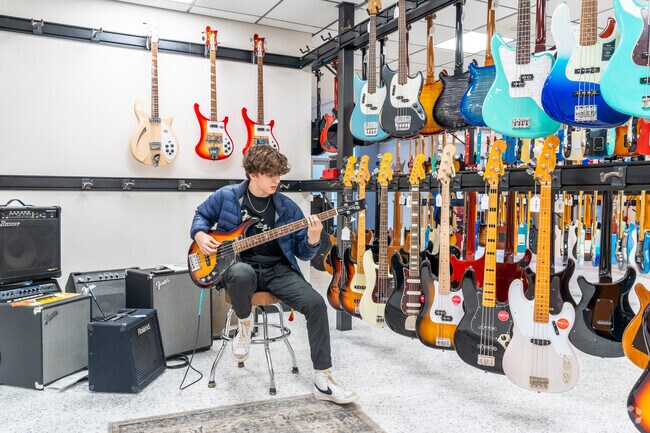 Dave's Guitar Shop sells both new and used guitars near Westwynde in downtown Sun Prairie.