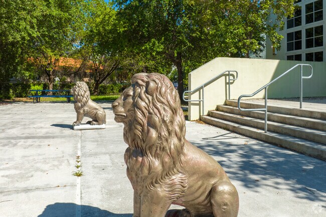 Lions stand outside of Wynwood's in Young Men's Preparatory Academy.