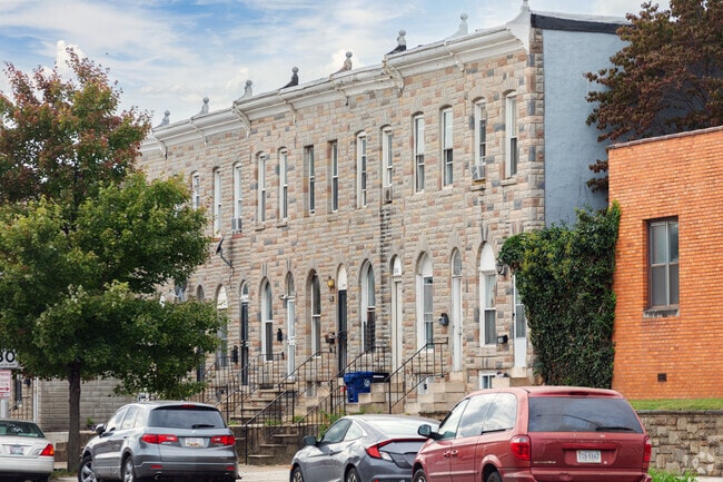 Many homes in Mill Hill have brick and stone facades.
