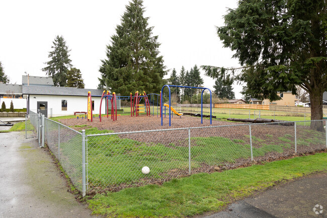 Swings and a play structure at Sonshine Christian Elementary in Vancouver, WA.