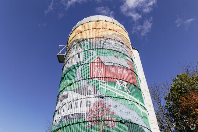 A mural in Lafayette depicts scenes of farm life.