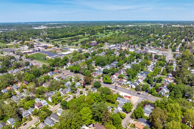 This aerial view shows the tree-lined streets of Groesbeck with the golf course within view.
